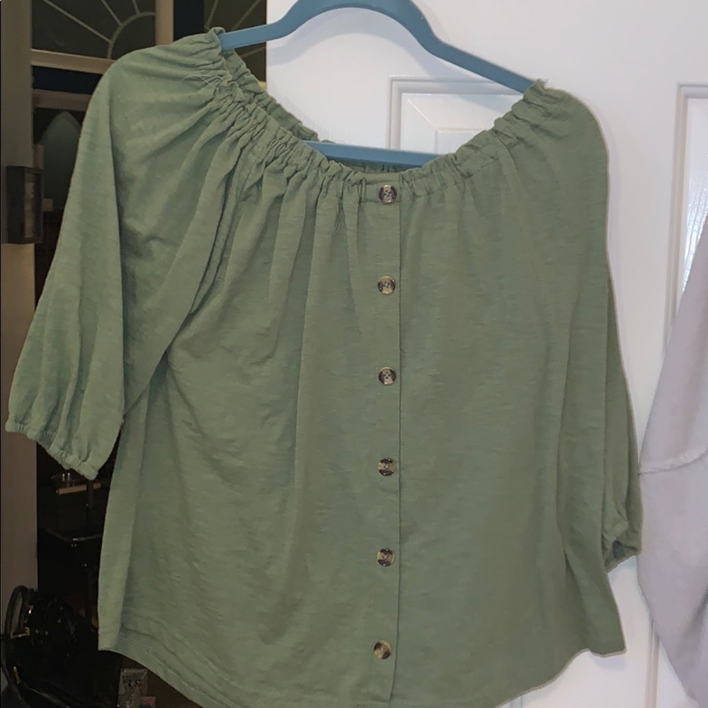Off shoulder with decorative buttons
